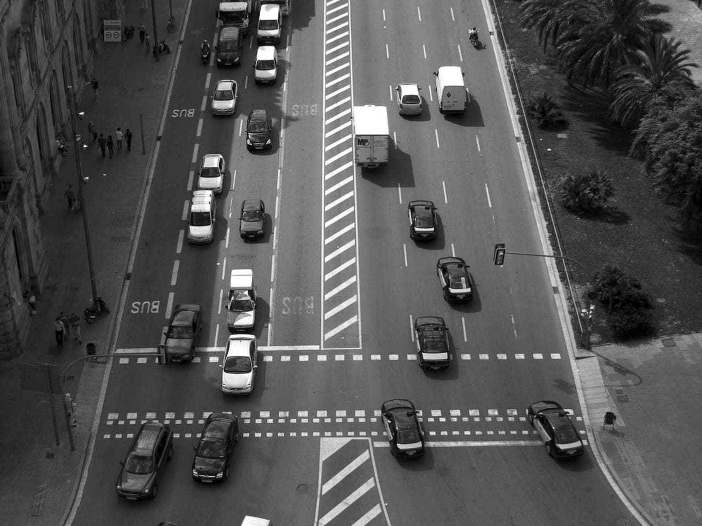 Overhead camera view of a city street with traffic